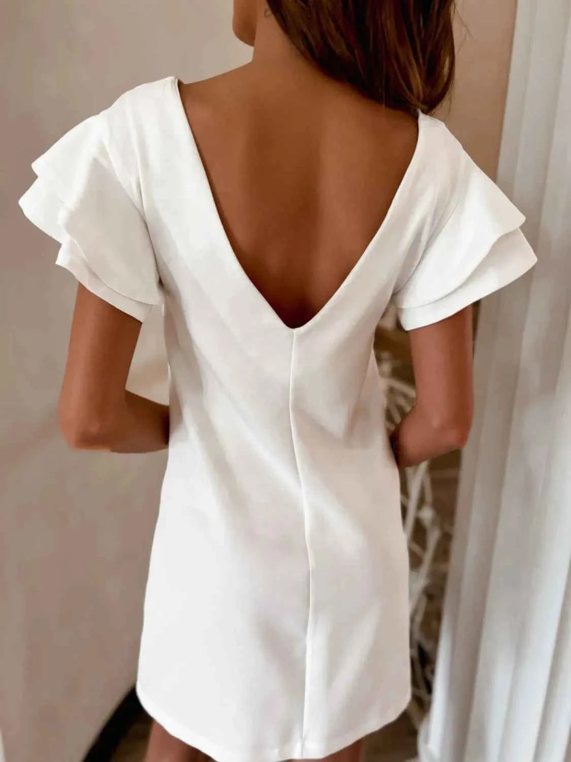 Ruffled Layered Backless Mini Dress.