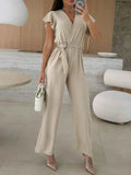 Surplice Wide Leg Belted Jumpsuit.