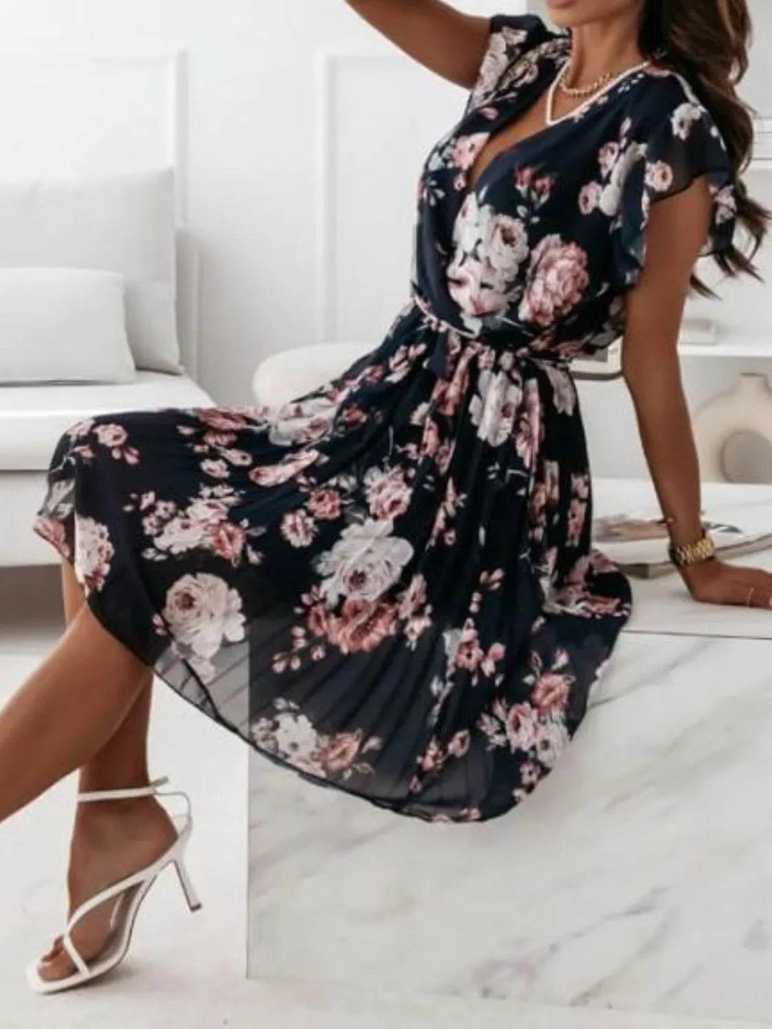 Floral Surplice Ruffled Cap Sleeve Dress.