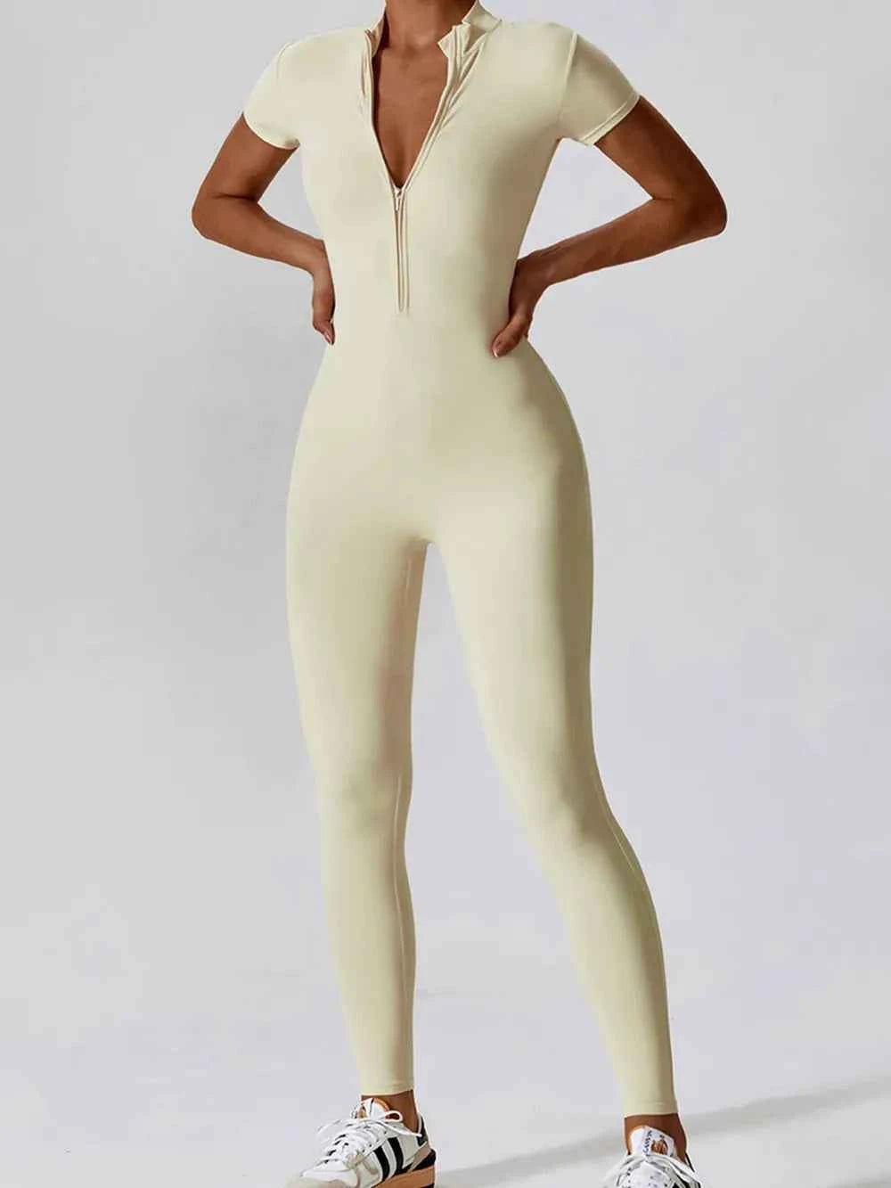 Basic Bae Half Zip Short Sleeve Active Jumpsuit.
