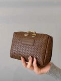 PU Leather Woven Clutch Bag.