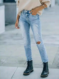 Distressed High Waist Jeans.