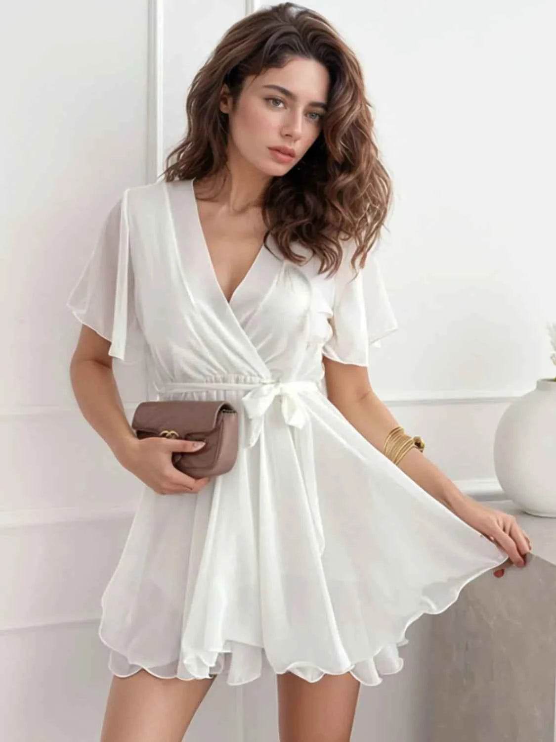 Surplice Flutter Sleeve Mini Dress.