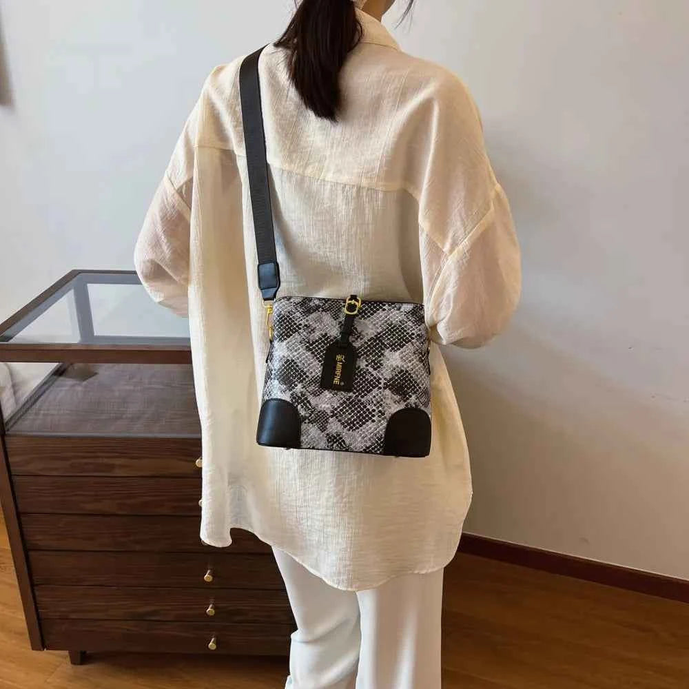 PU Leather Snakeskin Print Crossbody Bag.