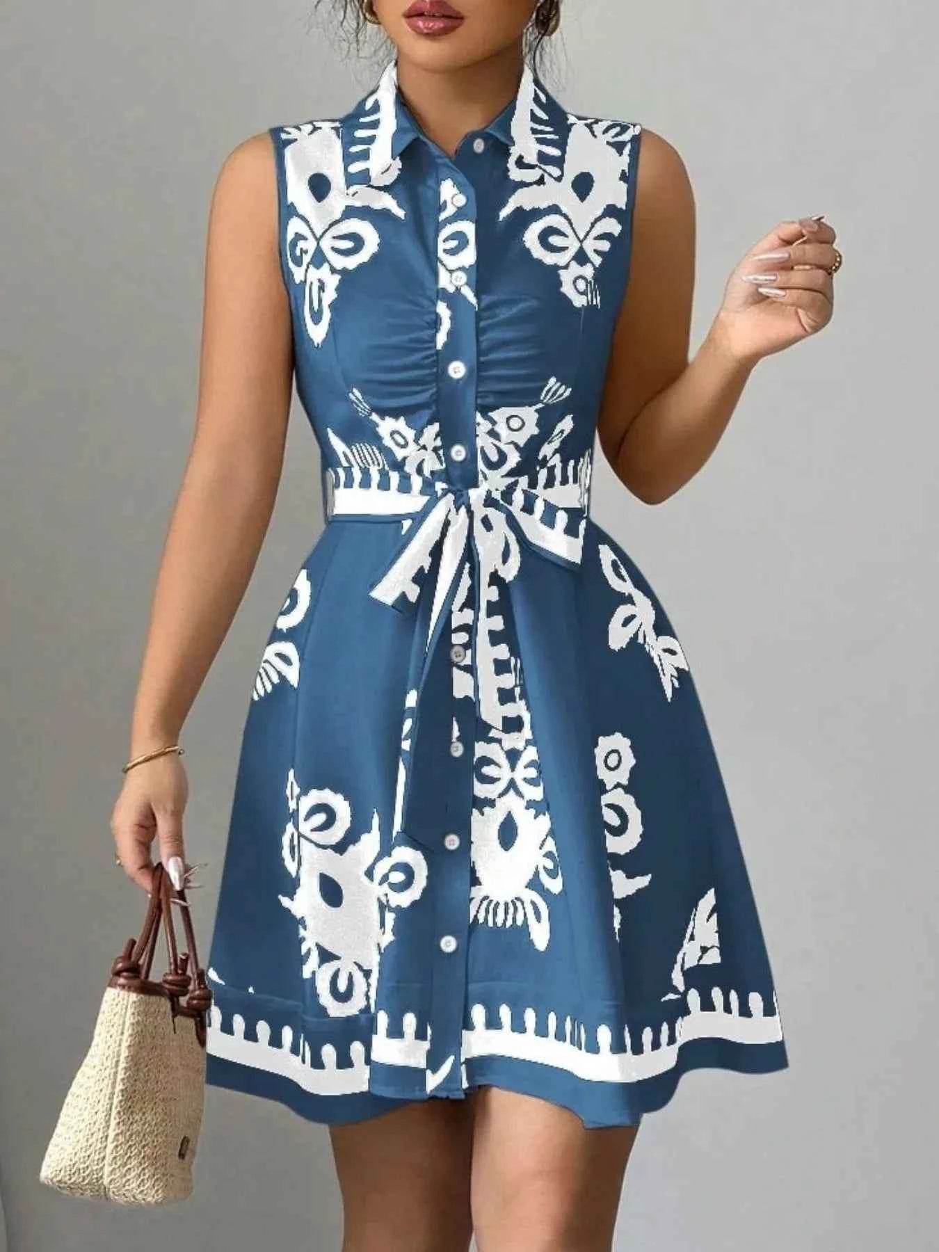 Printed Sleeveless Tie Waist Mini Dress.