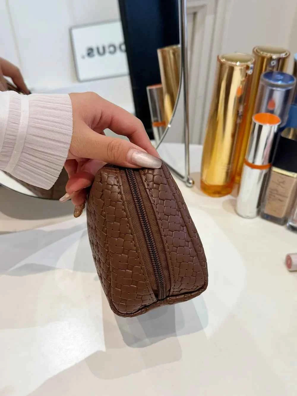 PU Leather Woven Clutch Bag.