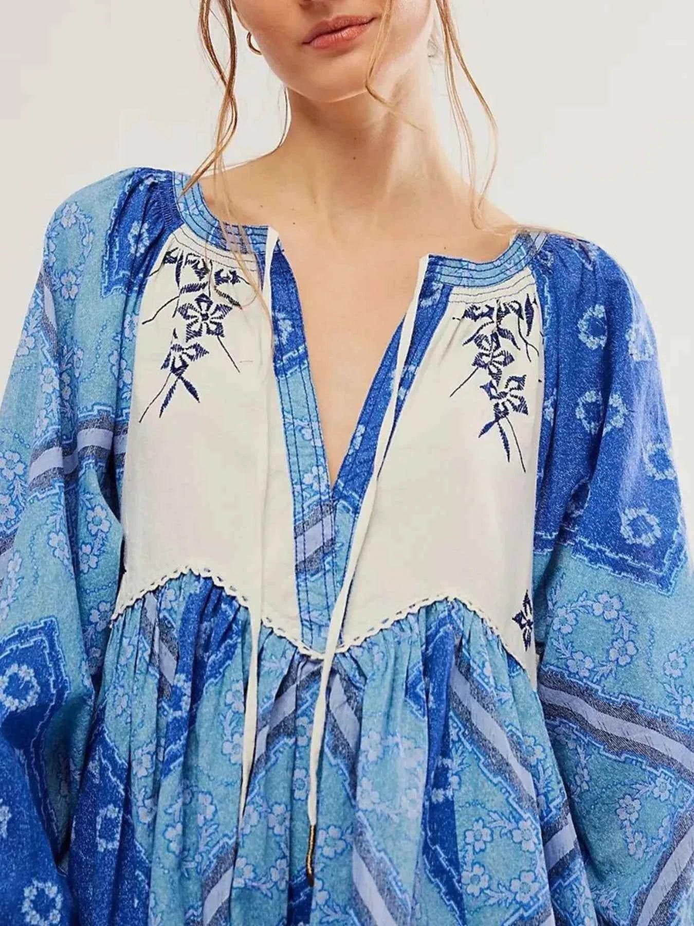 Printed Tie Neck Long Sleeve Dress.