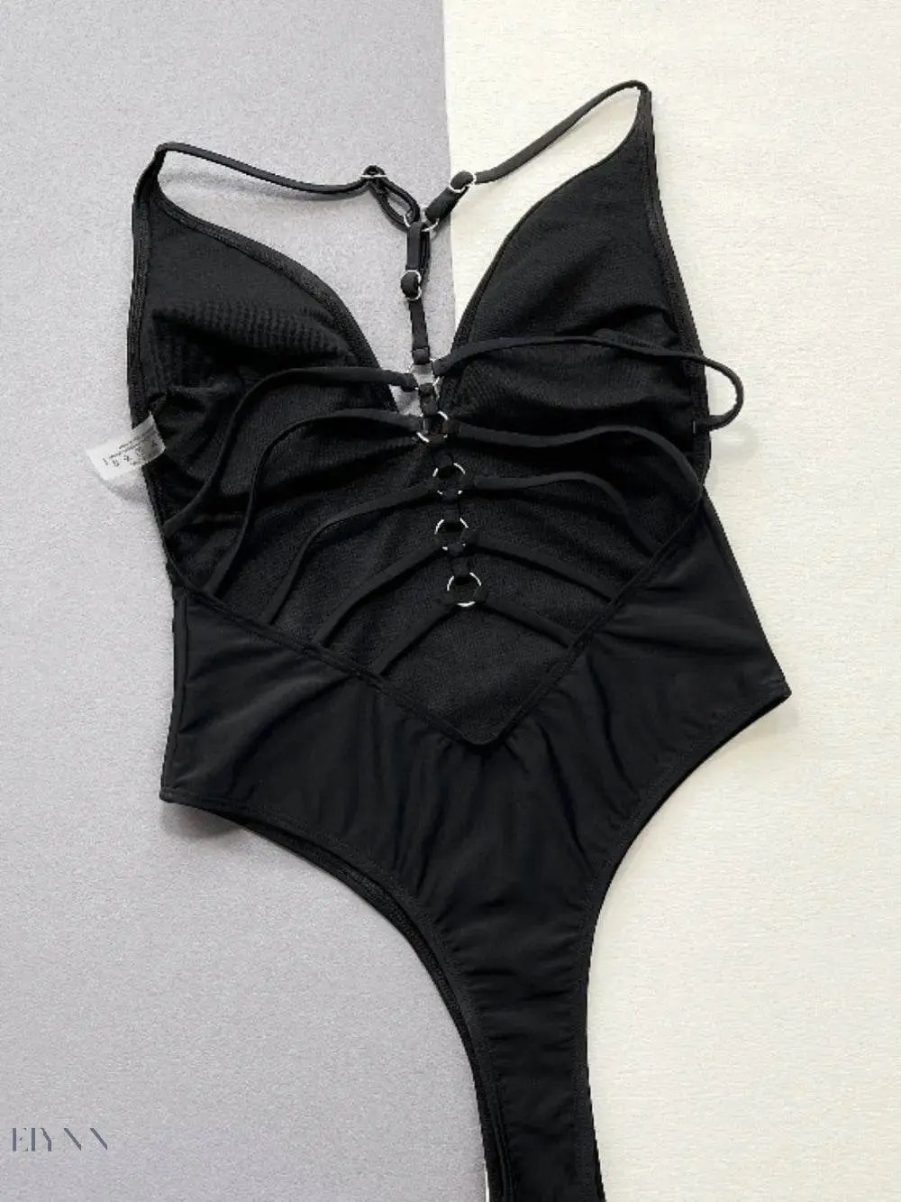 Trendy black spaghetti strap swimwear with stylish ruched detailing and a flattering cut
