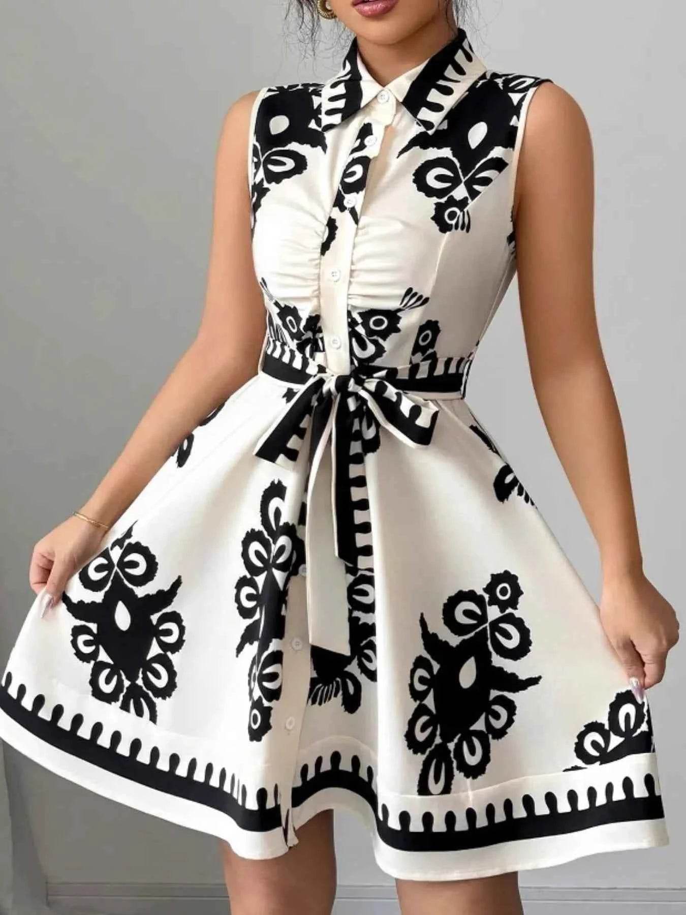 Printed Sleeveless Tie Waist Mini Dress.