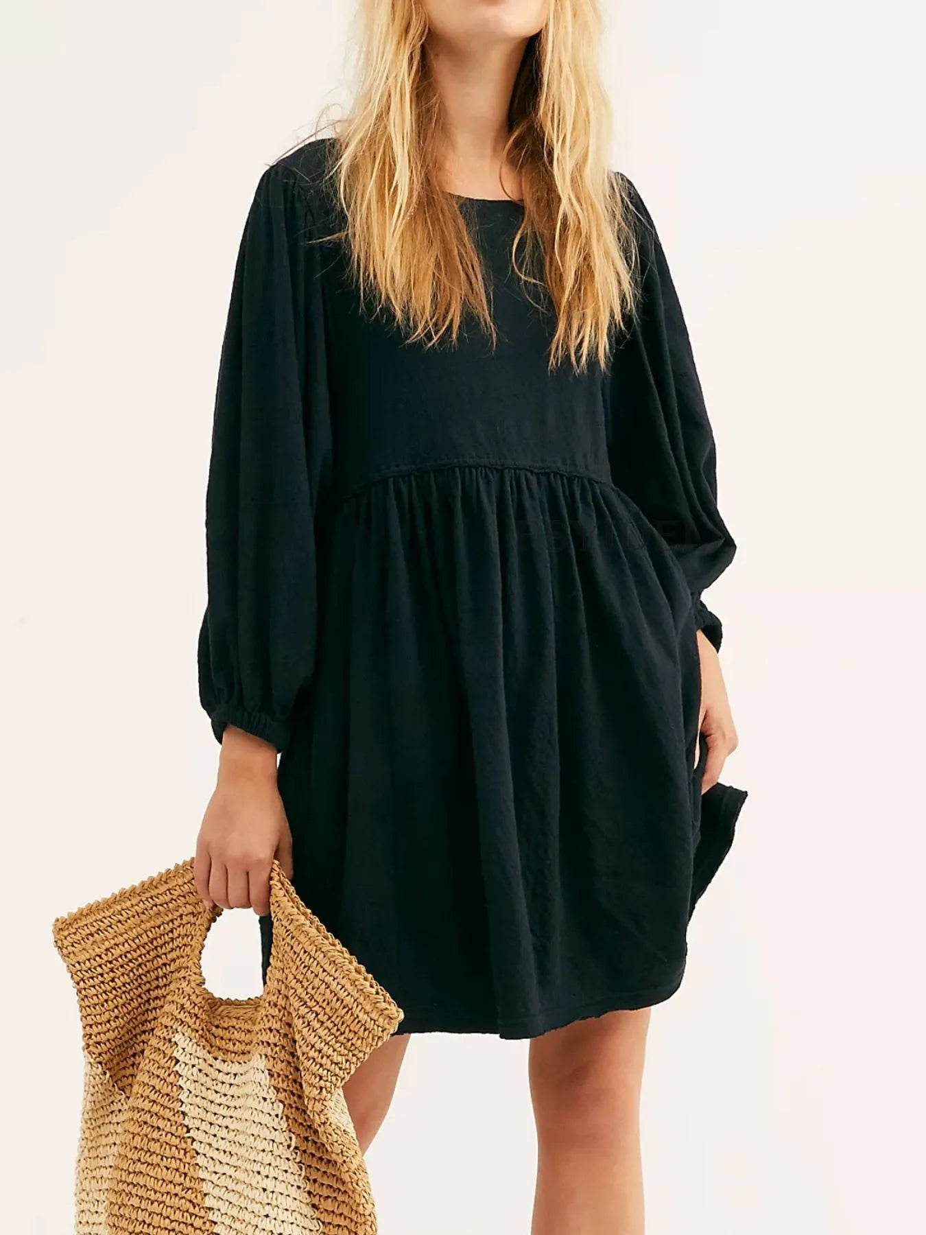 Relaxed Textured Babydoll Mini Dress with Keyhole Back.