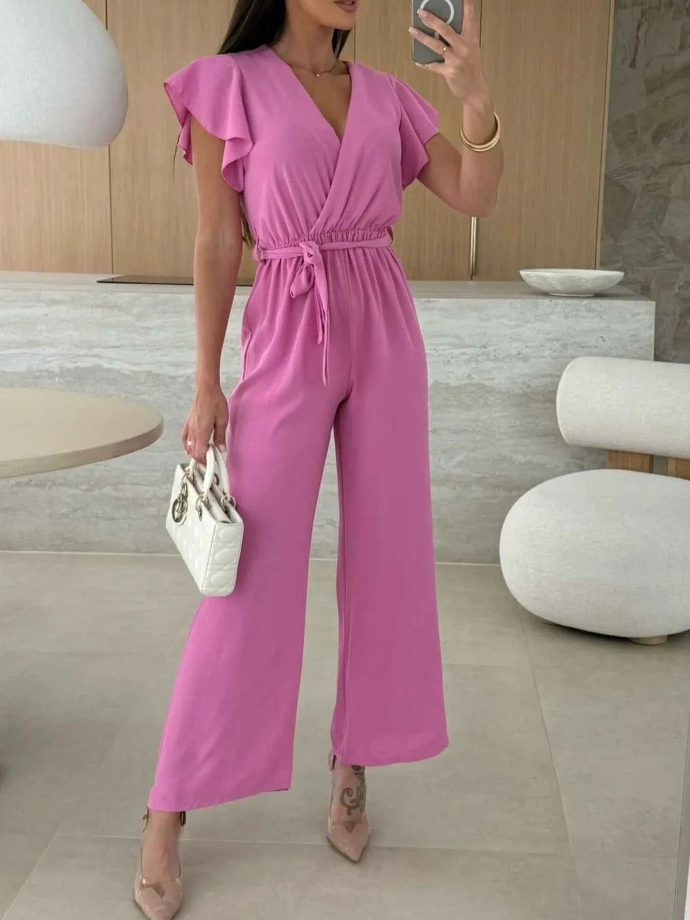Surplice Wide Leg Belted Jumpsuit.