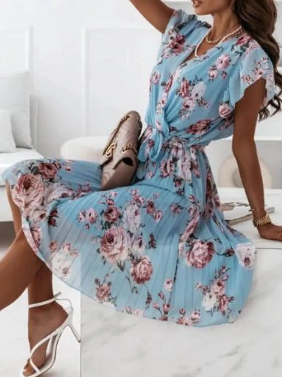 Floral Surplice Ruffled Cap Sleeve Dress.
