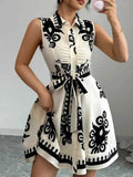 Printed Sleeveless Tie Waist Mini Dress.