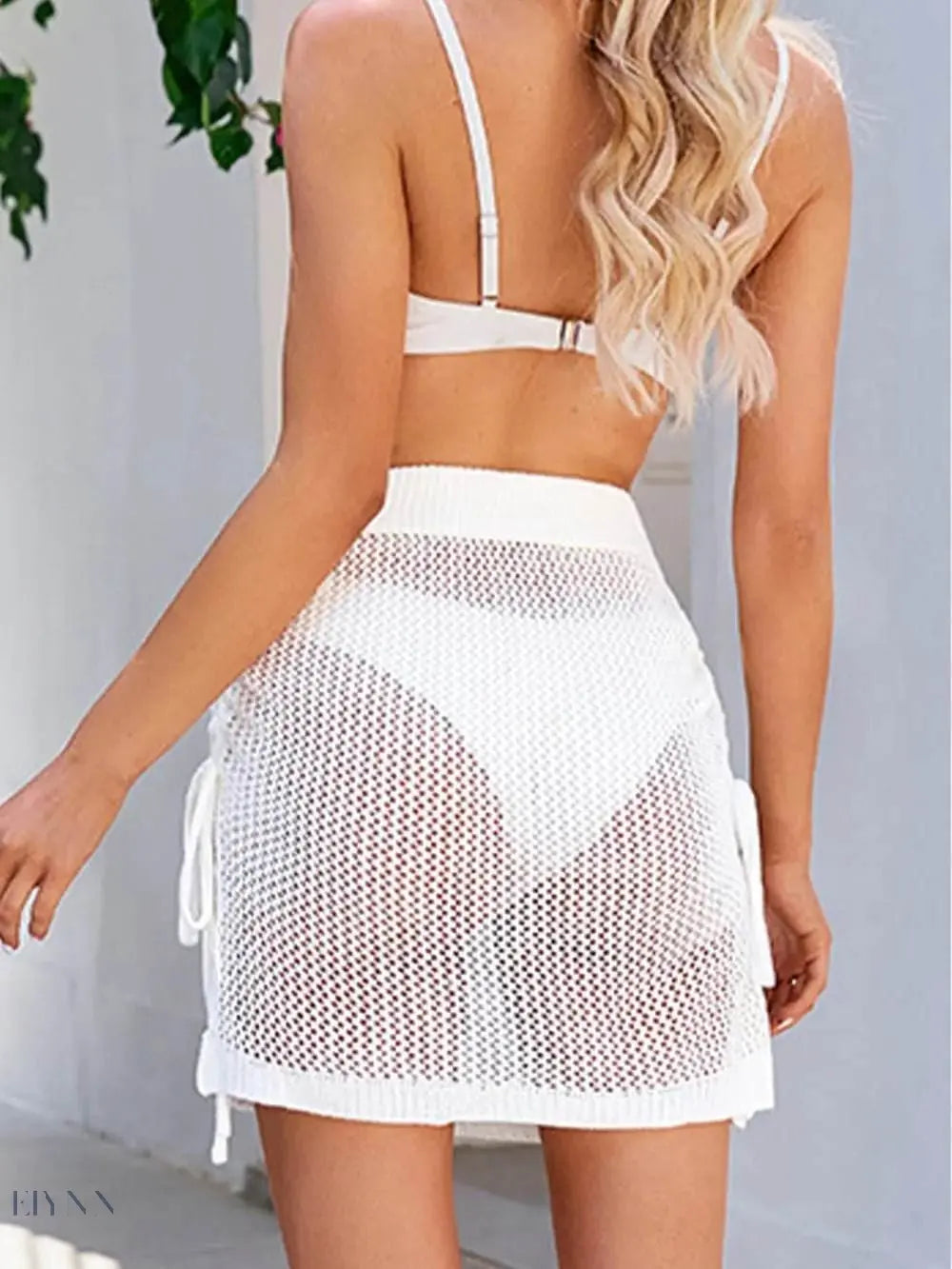 Women’s White Drawstring Swim Skirt in a Mesh Design, perfect for beach outings and pool days