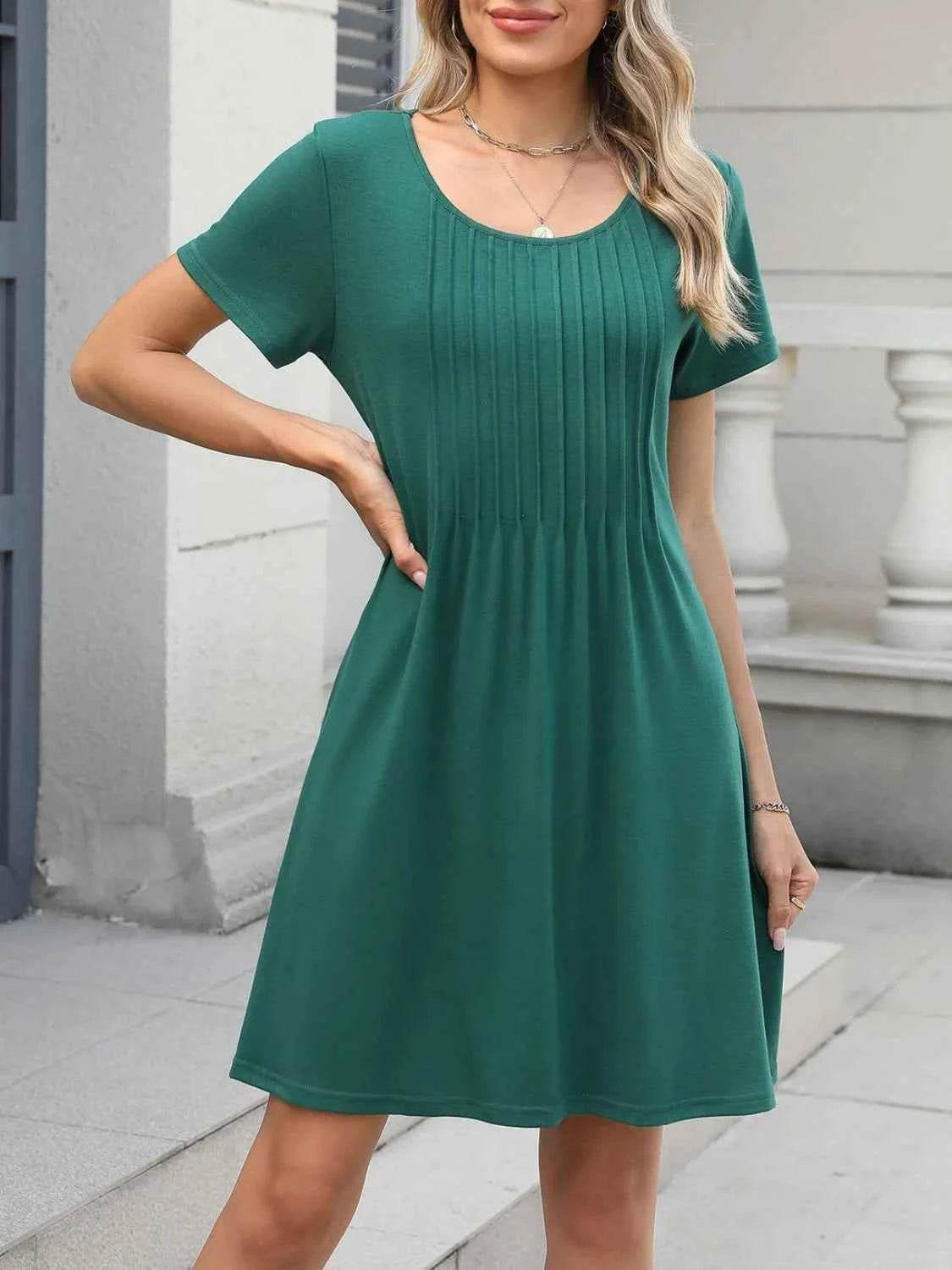 Pleated Front Round Neck Swing Dress.