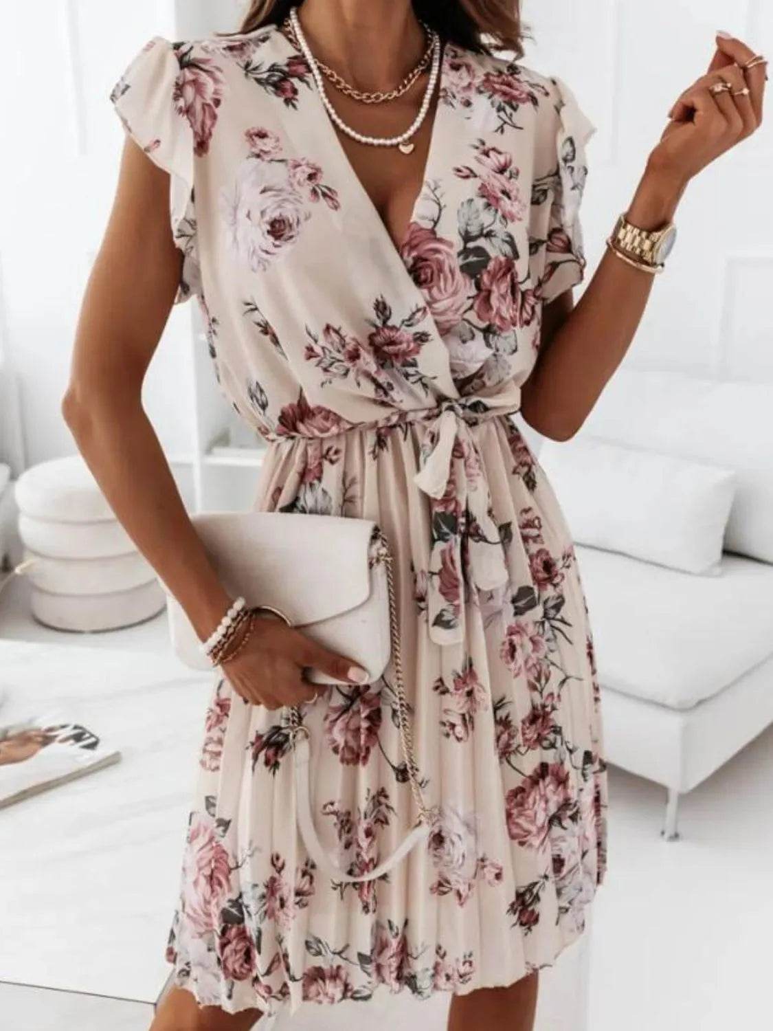 Floral Surplice Ruffled Cap Sleeve Dress.