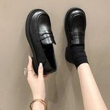 Round Toe Leather Loafers.