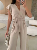 Surplice Wide Leg Belted Jumpsuit.