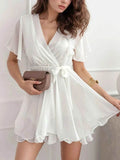 Surplice Flutter Sleeve Mini Dress.