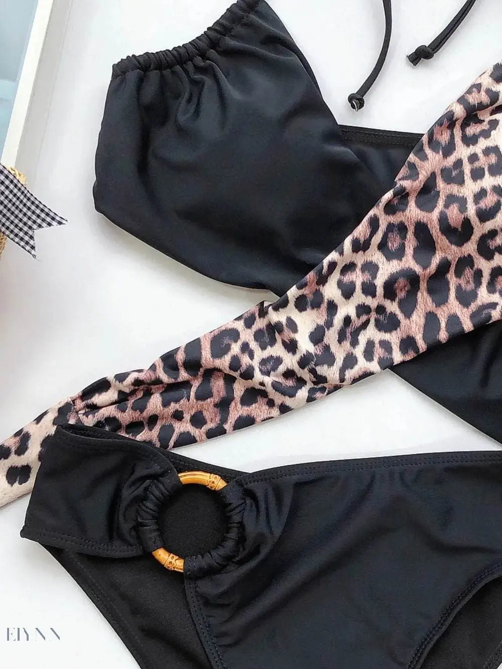 Luxury halter bikini for summer featuring a stylish leopard print design and black accents