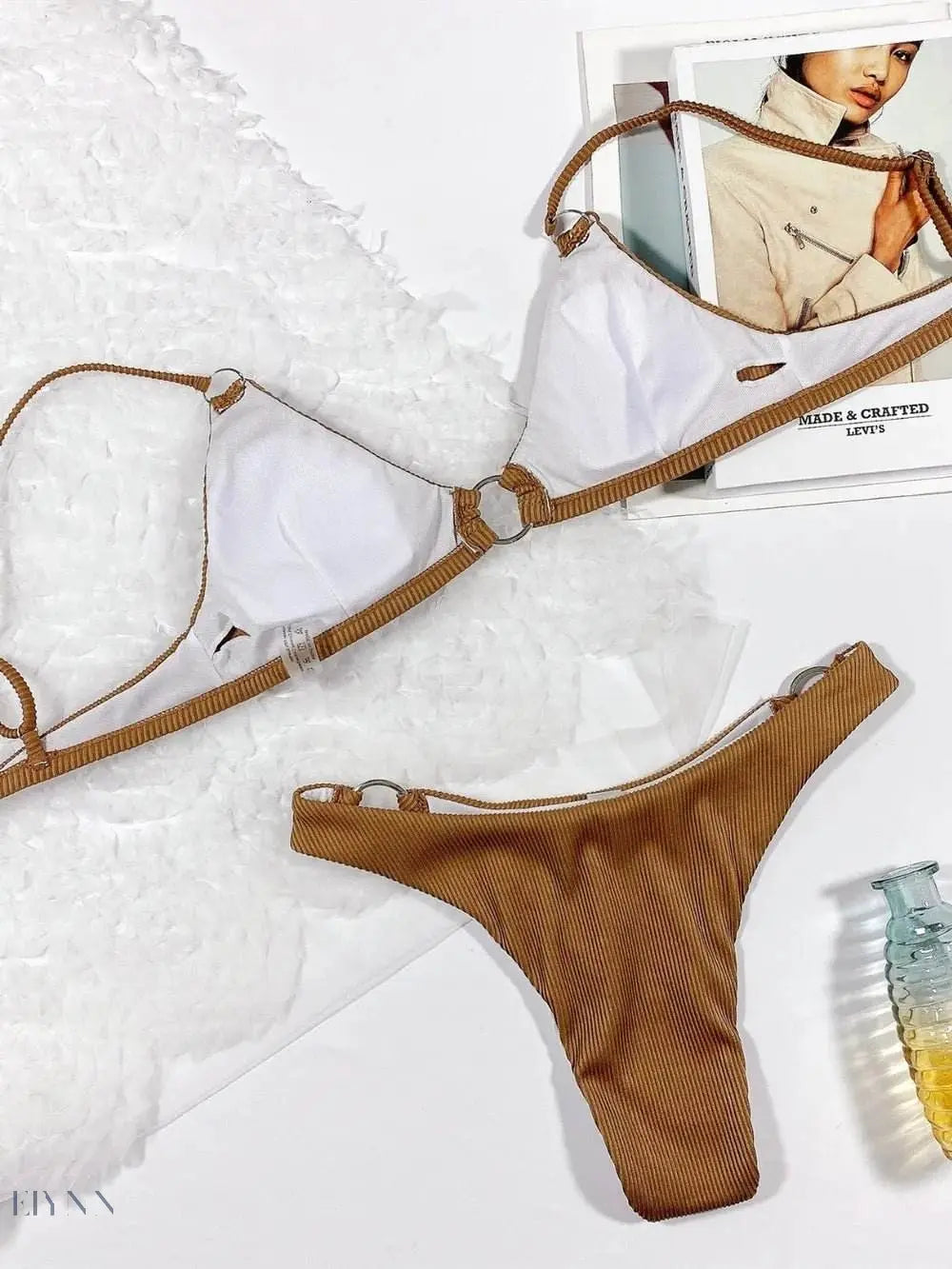 Trendsi plunge spaghetti strap bikini set featuring a stylish white top and tan bottom