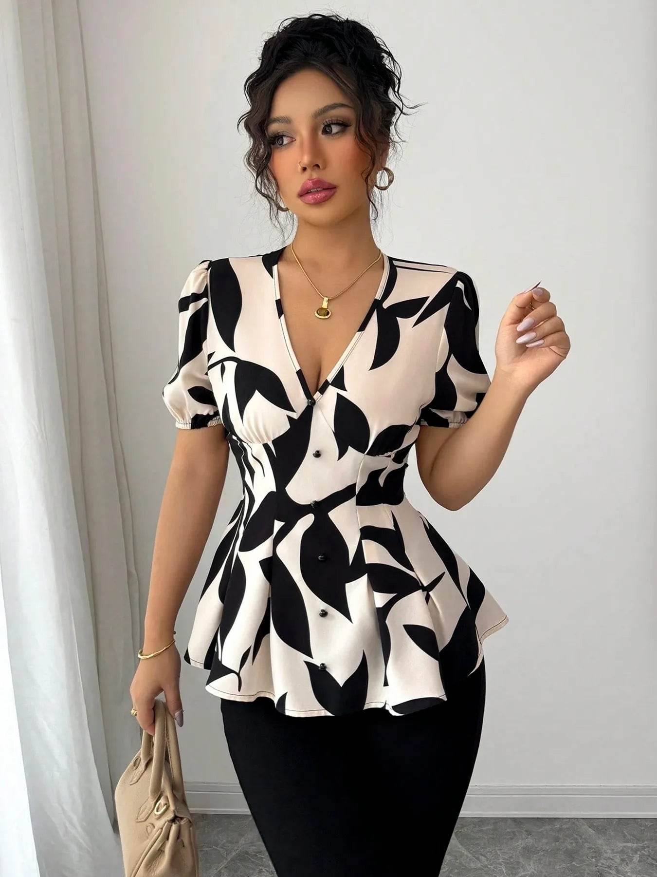 Puff Sleeve Peplum Blouse in Eye-Catching Prints - EBYNN
