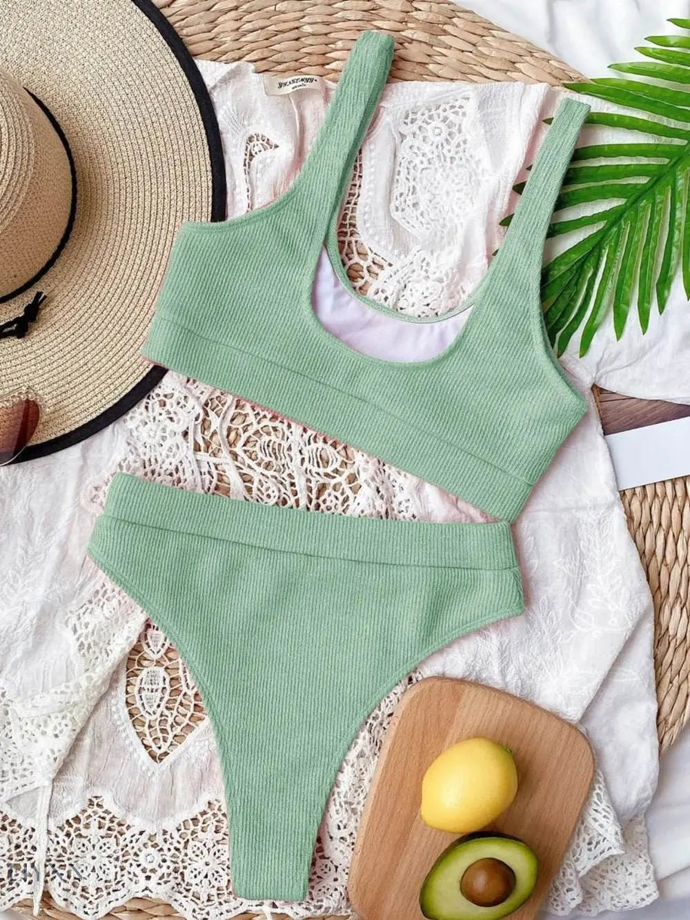 Scoop neck bikini set in green ribbed fabric with a comfortable fit for beach outings