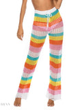 Trendy women's colorful resort wear crochet pants with vibrant stripes for beach or vacation styling